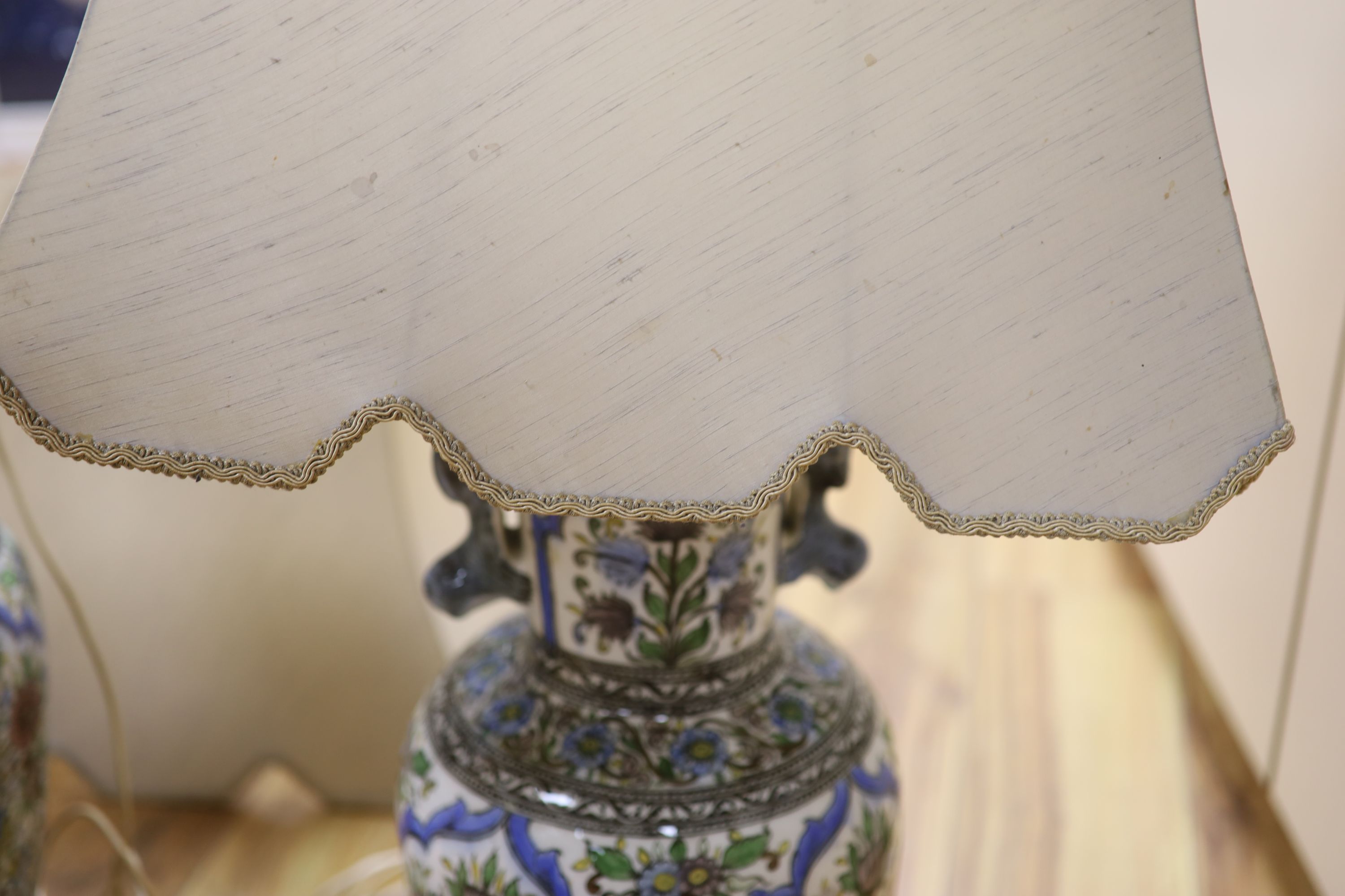 A pair of modern Persian-style pottery vases, fitted as table lamps, height 50cm